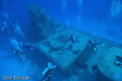 The dive boat anchored above the Tibbets and everyone des... by Don Bricker 